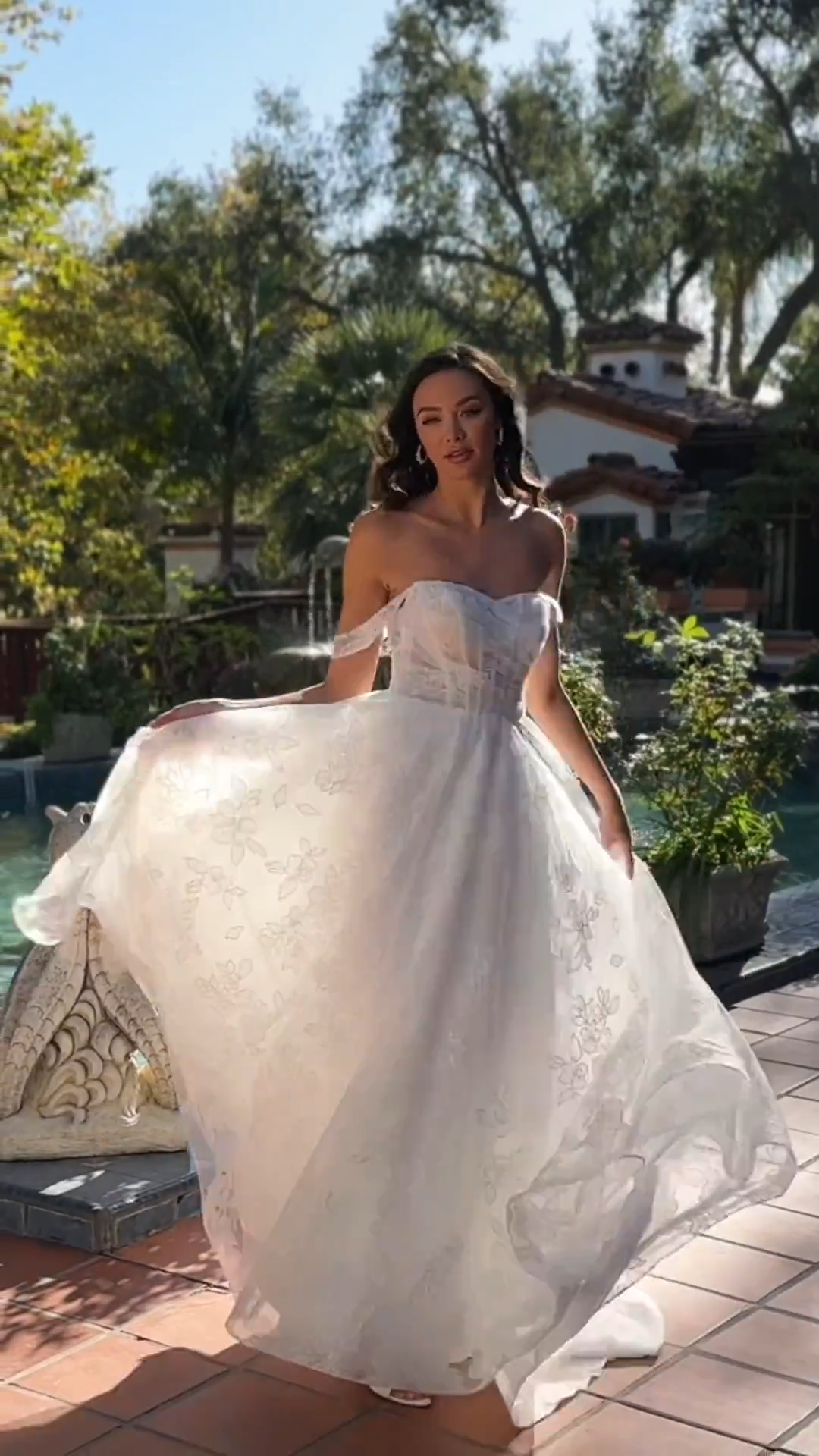 Style HART Unlined sweetheart and open back embroidered organza with detachable swag sleeves A-line gown