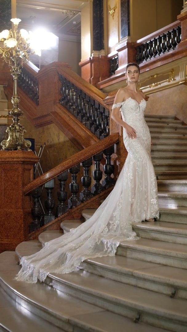 Val Stefani Bridal D8272 Beaded Floral Lace Strapless Mermaid Bridal Gown With Swag Sleeves And Long Sheer Shaped Sparkle Train Val Stefani Bridal D8272 Beaded Floral Lace Strapless Mermaid Bridal Gown With Swag Sleeves And Long Sheer Shaped Sparkle Train