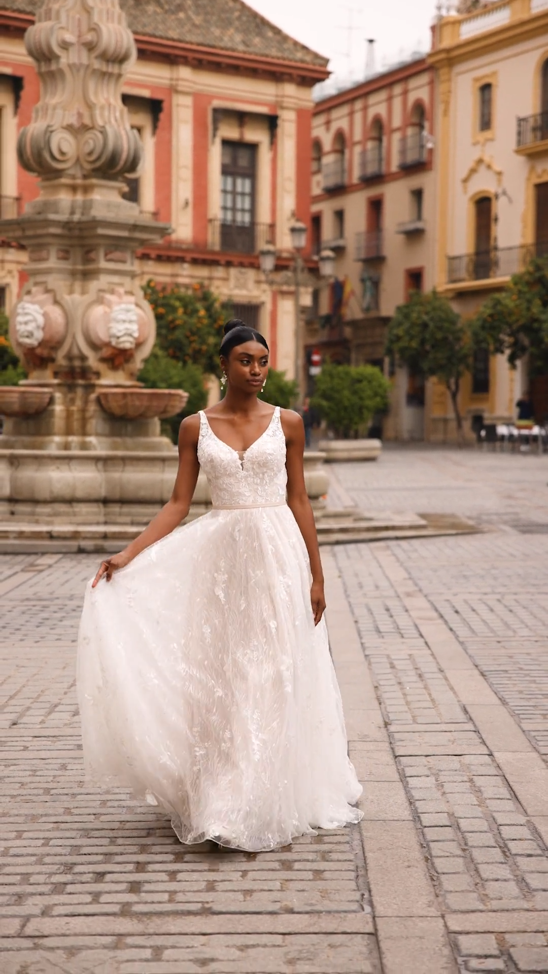 Style NINA V-Neck and Deep V-Back Floral Embroidered Net with Sequins A-Line with Couture Band at Drop Waist Style NINA V-Neck and Deep V-Back Floral Embroidered Net with Sequins A-Line with Couture Band at Drop Waist