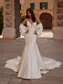 Mermaid satin wedding dress with lace bodice and dramatic bow shrug Mermaid satin wedding dress with lace bodice and dramatic bow shrug