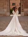 Satin wedding dress with bow shrug and cathedral satin and lace train Satin wedding dress with bow shrug and cathedral satin and lace train